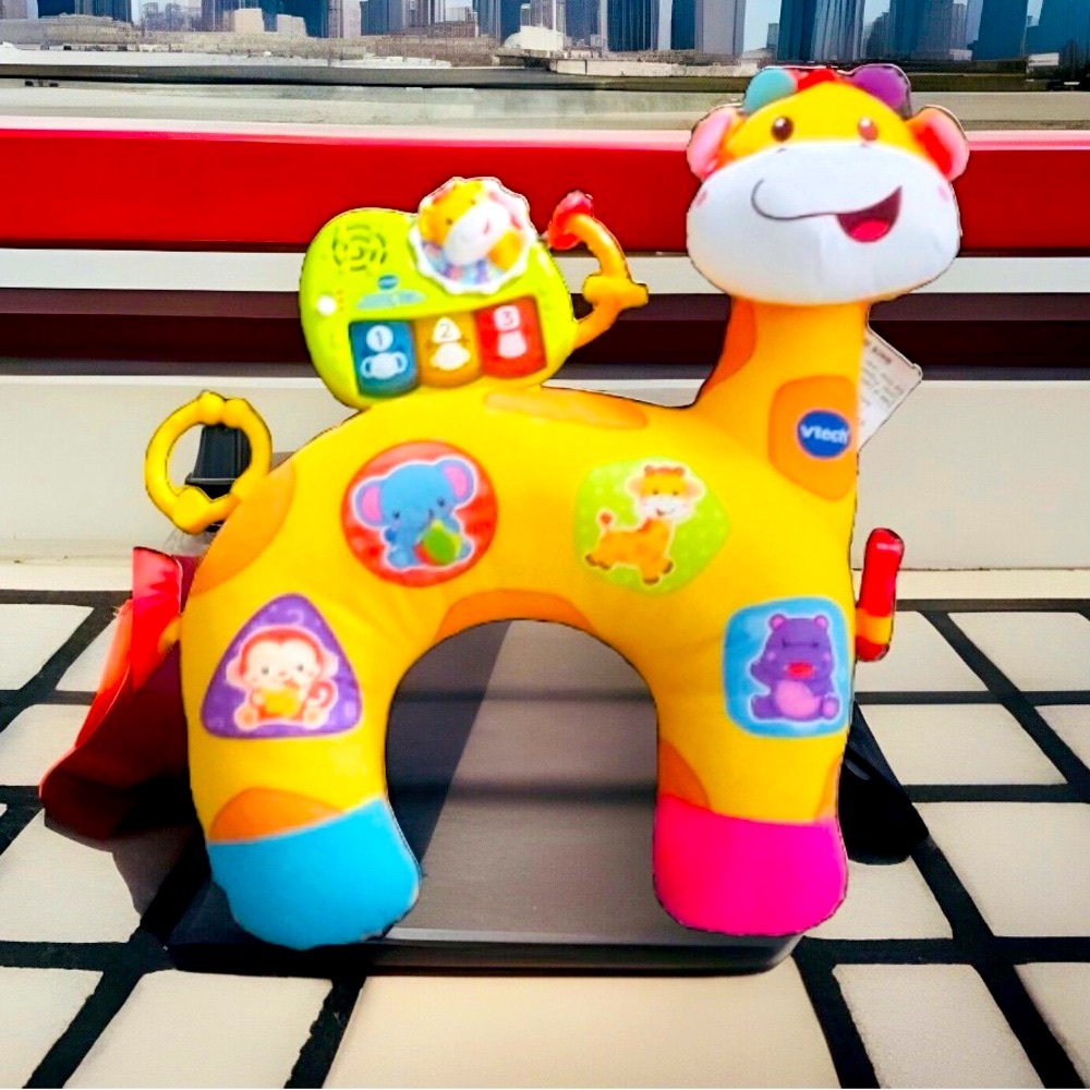 VTech Tummy Time Pillow
VTECH
TUMMY TIME GIRAFFE
GENTLY USED
BATTERIES 
INCLUDED